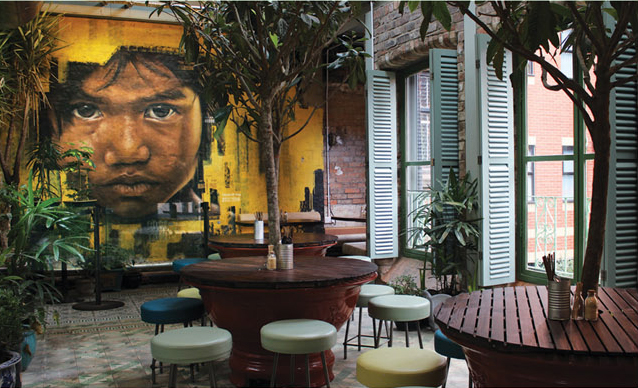 The plant-filled interior of Coco Tang Asian Café